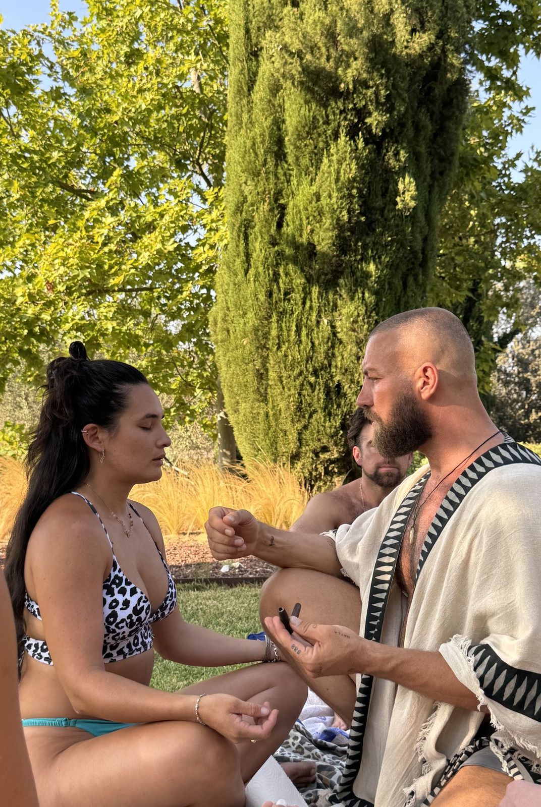 A guide opening the ceremony with a guest